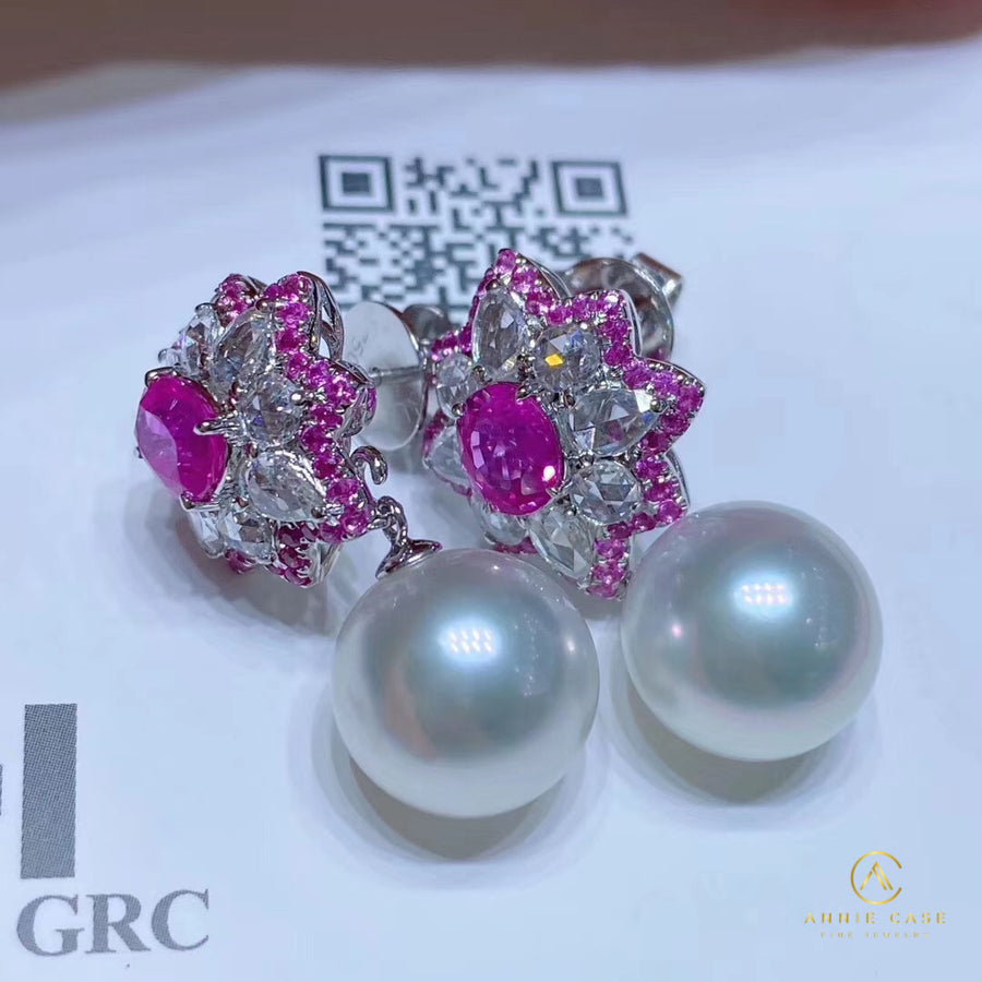 Diamond and Australian white south sea pearl earrings.